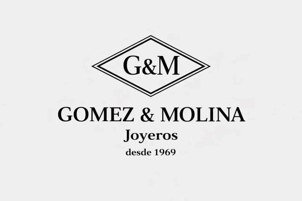 Logo de Gómez & Molina Joyeros, firma de alta joyería fundada en 1969 en Marbella, con identidad clásica en blanco y negro.