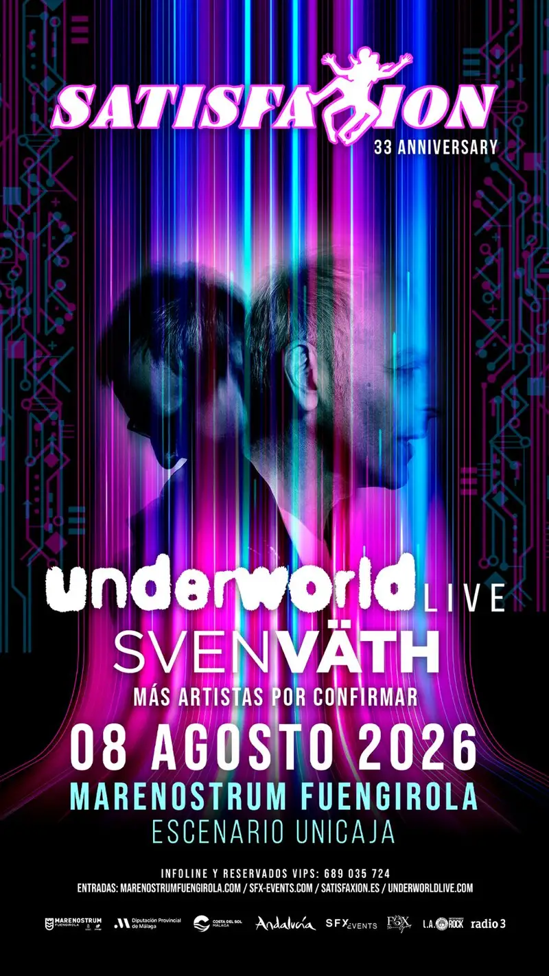 Underworld performing live with vibrant lights and crowd