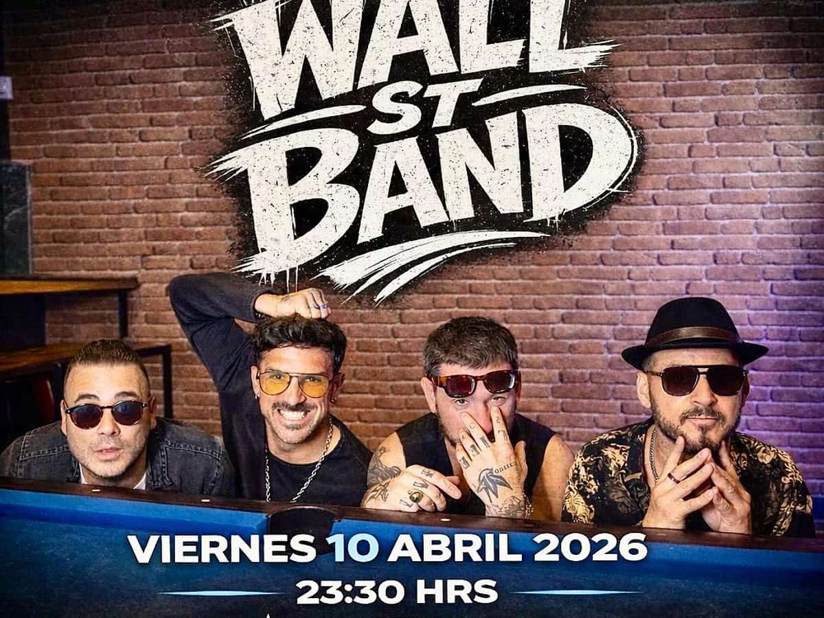 Cartel promocional de Wall St Band en Premiere Club con cuatro miembros de la banda posando frente a una pared de ladrillo. El concierto es el viernes 10 de abril de 2026 a las 23:30 h en Marbella.