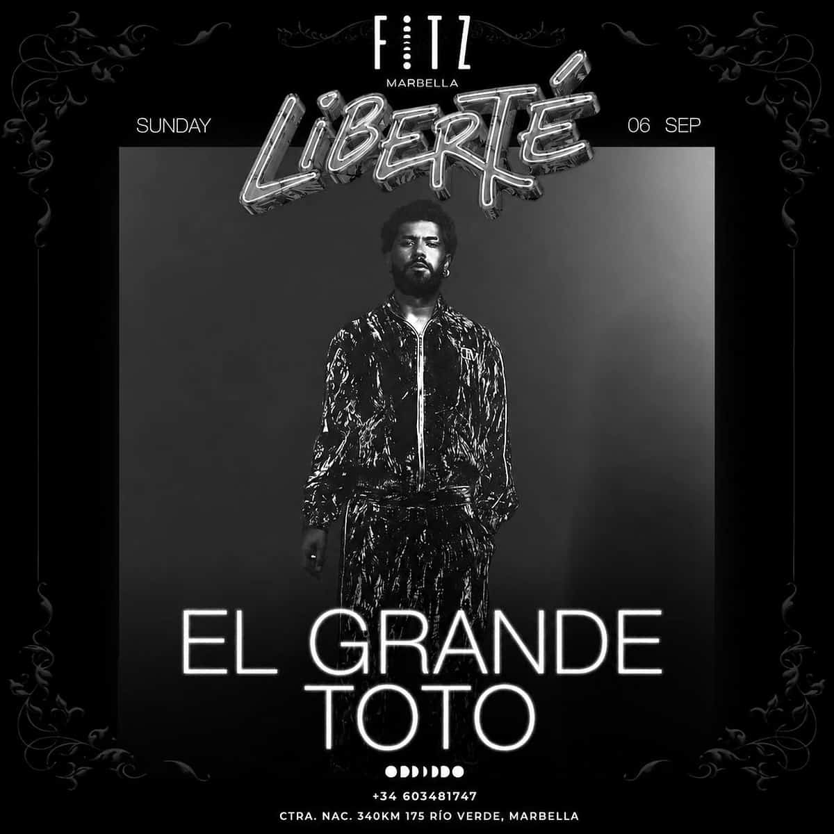 Poster for El Grande Toto at FITZ Marbella on Sunday 6 September, with black-and-white aesthetic, ornamental frame, Liberté logo, artist portrait and glowing typography with his name.