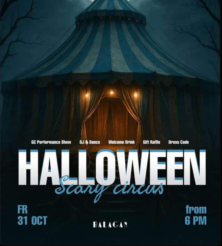 Carpa de circo iluminada bajo la luna llena para el evento Halloween Circo del Terror en Balagan Marbella.