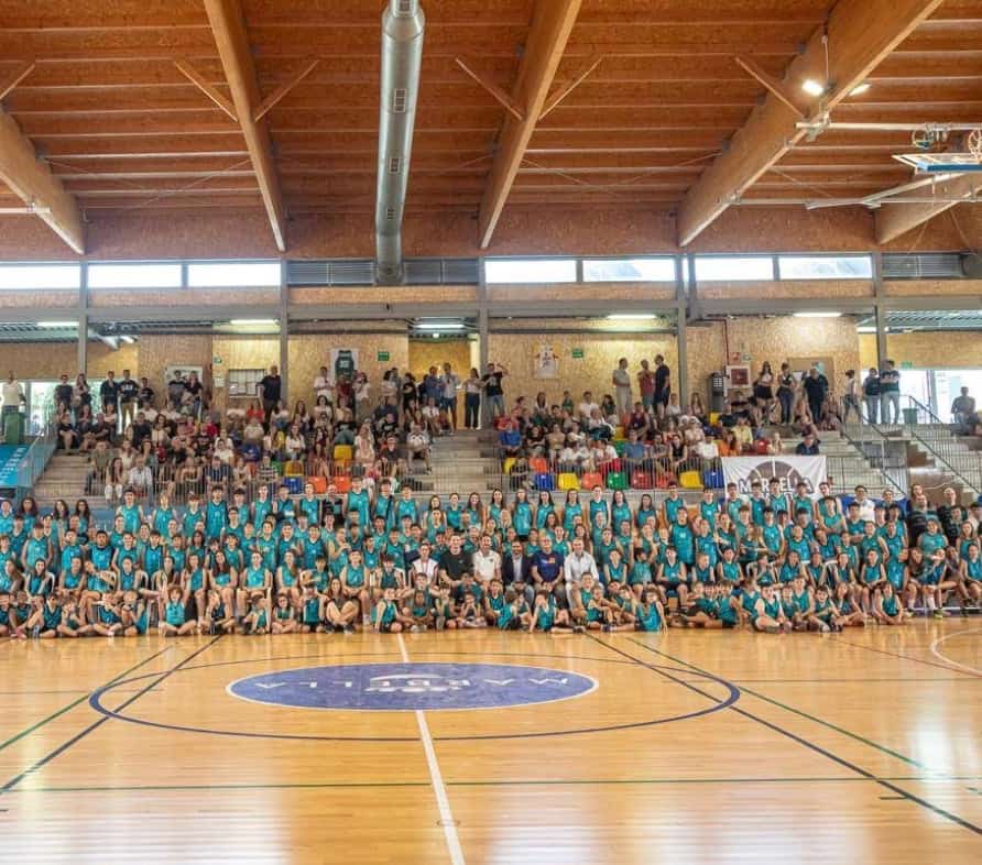 Interior view of the Carlos Cabezas Pavilion in Marbella, showing court and bleacher seating.