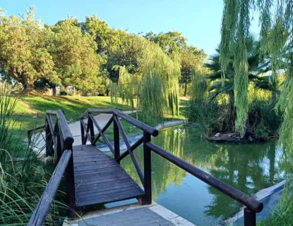 Parque de Huelin logo