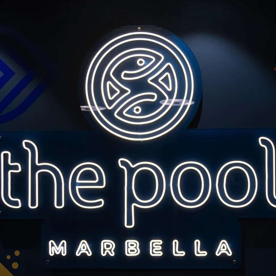 Modern open-plan coworking space at The Pool Marbella located in El Corte Inglés El Capricho featuring glass meeting rooms, ergonomic workstations, and natural lighting for professionals.